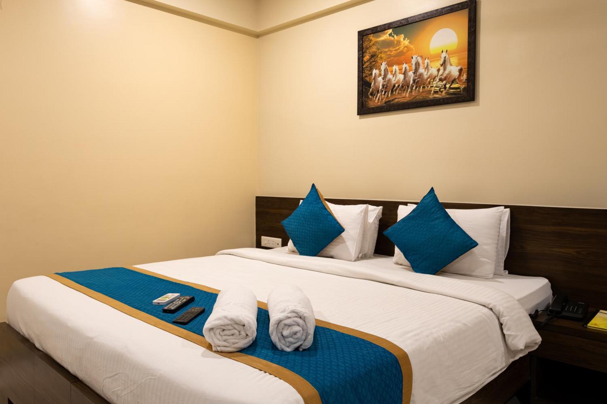 Spacious deluxe room at Kedari Residency